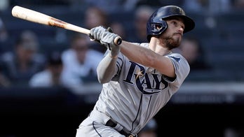 Lowe hits 3 HRs, Rays roll 12-2 to prevent Yankees WC clinch