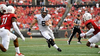 Armstrong rallies UVa late to 34-33 comeback over Louisville