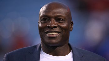 NFL legend Bruce Smith shows off his own QB graveyard with 70 tombstones