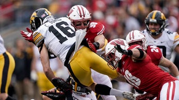 Defense carries Wisconsin to 27-7 triumph over No. 9 Iowa