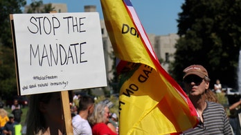Thousands protest Washington state's vaccine mandate, sing national anthem