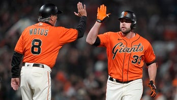 Giants clinch at least tie in NL West, match team wins mark