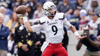No. 2 Cincinnati stays unbeaten with 27-20 win over Navy