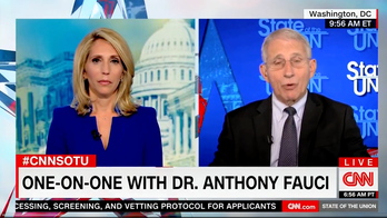 Fauci accused of undermining vaccine for saying it's 'tough to predict' when Americans can go maskless indoors