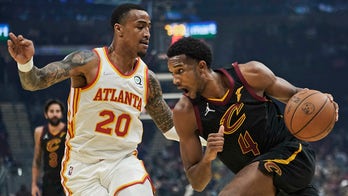 Mobley has double-double, Cavs beat Hawks 101-95 for 1st win