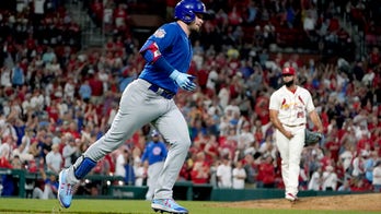 Happ's home run caps comeback as Cubs stun Cardinals 6-5