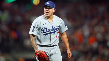 Urías hits, pitches Dodgers past Giants to even NLDS series