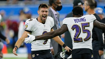 Ravens' record-setting Tucker embraces the spotlight
