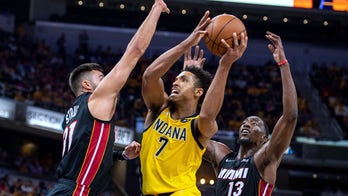 Brissett helps Pacers pull away from Heat in overtime