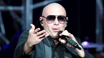 Rapper Pitbull says 'f--- you' to critics of America, tells them to go to Cuba
