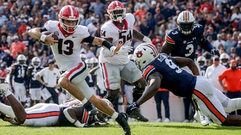 Bennett, No. 2 Georgia romp over No. 18 Auburn 34-10