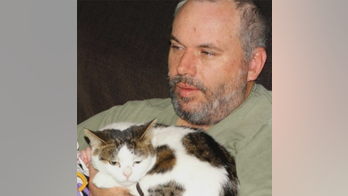 Australian former soldier accused of storming animal shelter to get cat back pleads guilty, reports say