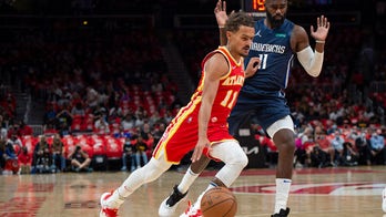 Young, Hawks open season with 113-87 rout of Mavericks