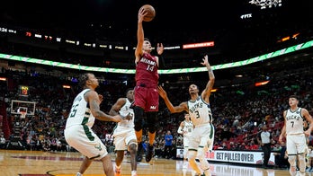 Herro scores 27 points, Heat rout Bucks 137-95 in opener