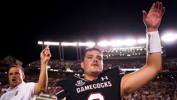 Ex-grad assistant Noland rallies South Carolina to 21-20 win