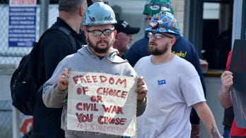 Vaccine mandates create conflict with defiant workers