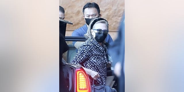Hillary Clinton is seen arriving to the UC Irvine Medical Center on Saturday. Former President Bill Clinton has been recovering at the hospital after being diagnosed with a urological sepsis infection.