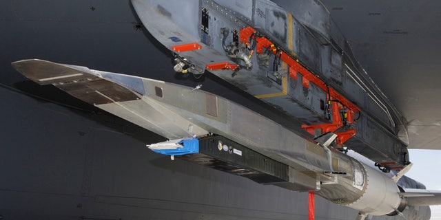 A U.S. Air Force B-52 prepares to carry the X-51 Hypersonic Vehicle out to the range for a launch test from Edwards AFB, California in this handout photo provided by the U.S. Air Force on May 1, 2013. The X-51 achieved Mach 5.1 traveling 230 nautical miles in just over six minutes making this test the longest air-breathing hypersonic flight ever. REUTERS/Bobbi Zapka/USAF/Handout via Reuters