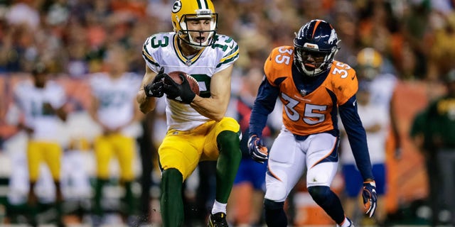 August 26, 2017; Denver, CO, USA; Green Bay Packers wide receiver Max McCaffrey (13) catches Denver Broncos safety Diamonte Thomas (35) in the third quarter at Sports Authority Grounds at Mile High. Mandatory Credit: Isiah J. Downing-USA Today Sports