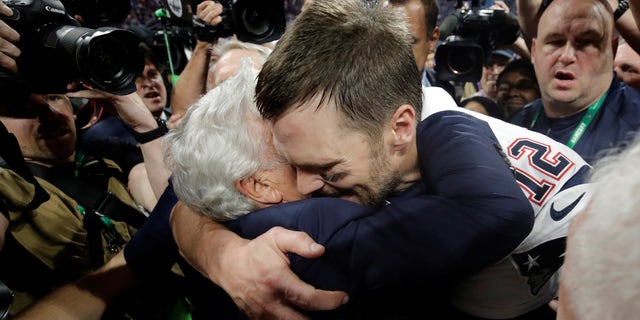 New England Patriots quarterback Tom Brady and Patriots owner Robert Kraft celebrate their 2019 Super Bowl victory.