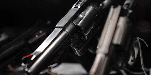 Revolvers are displayed for sale at Firearms Unknown, a gun store in Oceanside, California.  REUTERS/Bing Guan