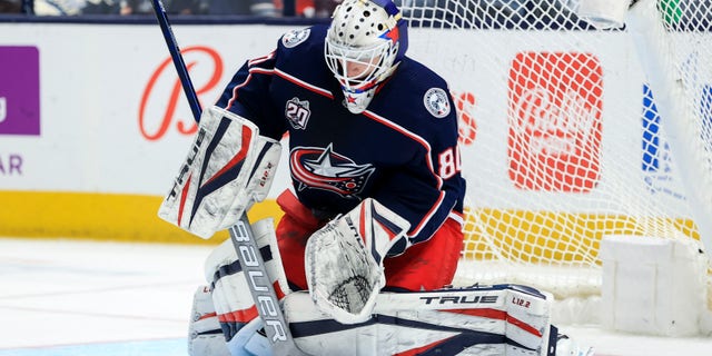 May 8, 2021; Columbus, Ohio, USA; Columbus Blue Jackets goaltender Matiss Kivlenieks (80) makes a save in net against the Detroit Red Wings in the second period at Nationwide Arena. Mandatory Credit: Aaron Doster-USA TODAY Sports