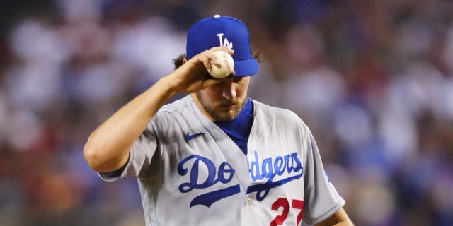 Los Angeles Dodgers pitcher Trevor Bauer reacts against the Arizona Diamondbacks at Chase Field.