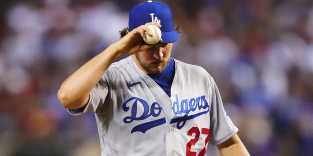 Los Angeles Dodgers pitcher Trevor Bauer reacts against the Arizona Diamondbacks at Chase Field.