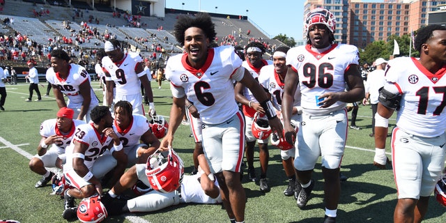 Sep 25, 2021; Nashville, Tennessee, USA; Georgia Bulldogs players celebrate after a win against the Vanderbilt Commodores at Vanderbilt Stadium. Mandatory Credit: Christopher Hanewinckel-USA TODAY Sports