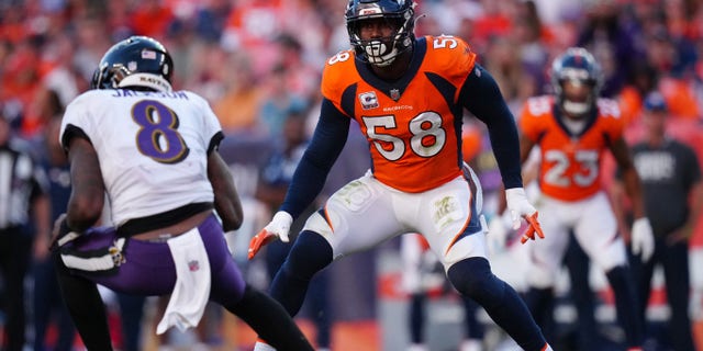 Oct 3, 2021; Denver, Colorado, USA; Denver Broncos outside linebacker Von Miller (58) chases down Baltimore Ravens quarterback Lamar Jackson (8) in the second half at Empower Field at Mile High.