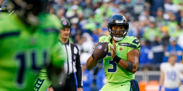 Oct 7, 2021; Seattle, Washington, USA; Seattle Seahawks quarterback Russell Wilson (3) looks to pass against the Los Angeles Rams during the second quarter at Lumen Field.