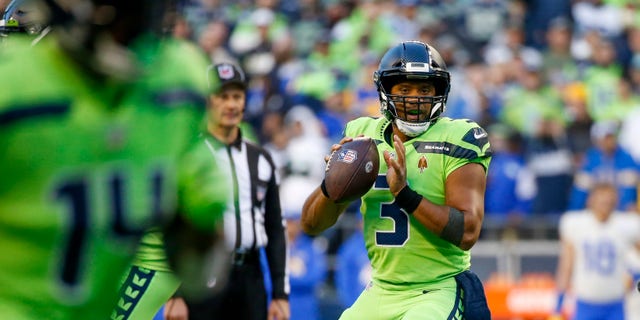 Oct 7, 2021; Seattle, Washington, USA; Seattle Seahawks quarterback Russell Wilson (3) looks to pass against the Los Angeles Rams during the second quarter at Lumen Field.