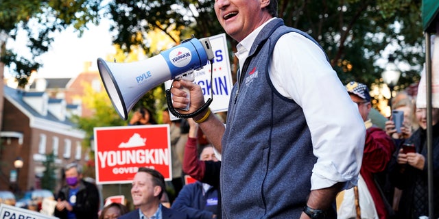 Virginia Republican gubernatorial nominee Glenn Youngkin speaks during a campaign event at Old Town Alexandria's Farmers Market in Alexandria, Virginia, October 30, 2021. REUTERS/Joshua Roberts