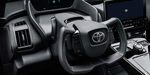 The bZ4X's drive-by-wire system uses a yoke-style steering wheel.