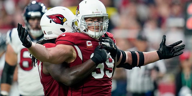 Arizona Cardinals defensive end JJ Watt celebrates a defensive stop against the Houston Texans during the first half of an NFL game at State Farm Stadium in Glendale, Arizona on October 24, 2021.