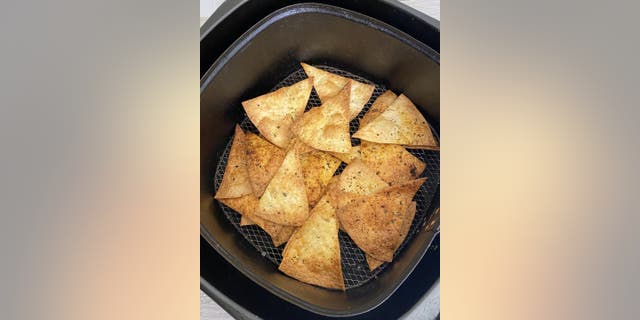 These air fryer tortilla chips only require olive oil and Cajun seasoning.