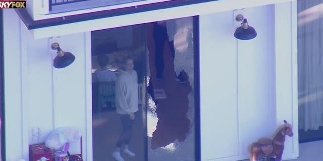 A downstairs door was broken at Kemsley's Encino Hills home. 