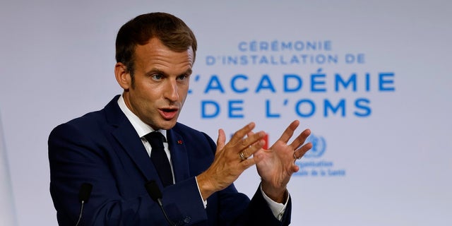 French President Emmanuel Macron delivers his speech during the opening of the World Health Organisation Academy in Lyon, central France, on Monday.