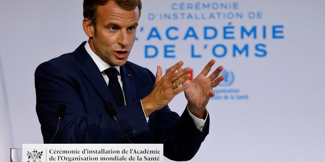 French President Emmanuel Macron delivers his speech during the opening of the World Health Organisation Academy in Lyon, central France, on Monday.
