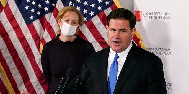 In this Dec. 2, 2020, file photo, Arizona Gov. Doug Ducey speaks at a press conference in Phoenix. (AP Photo/Ross D. Franklin, Pool)