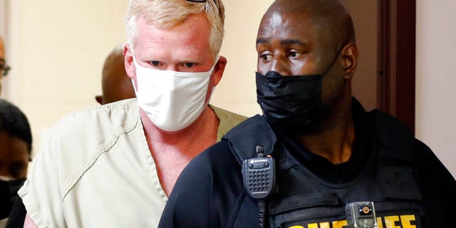 Alex Murdaugh walks into his bond hearing Thursday, Sept. 16, 2021, in Varnville, S.C. (AP Photo/Mic Smith)