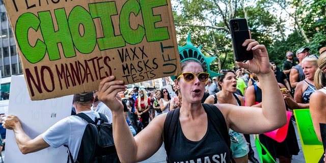 Teachers protest against the COVID-19 vaccination mandates in New York on Wednesday Aug. 25, 2021. (AP Photo/Mary Altaffer, File)