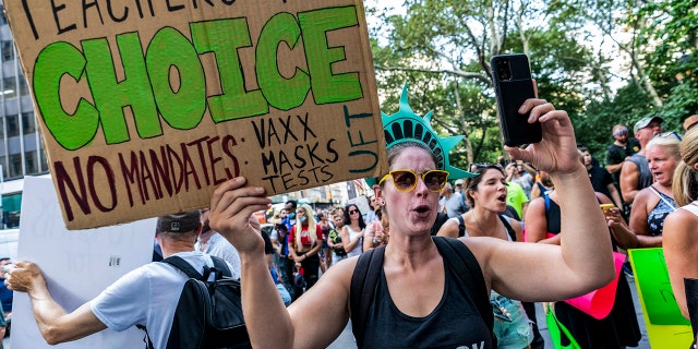 Teachers protest against the COVID-19 vaccination mandates in New York on Wednesday Aug. 25, 2021. (AP Photo/Mary Altaffer, File)