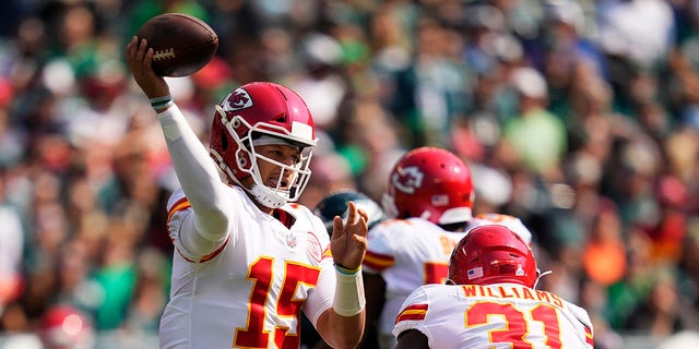 Kansas City Chiefs quarterback Patrick Mahomes (15) looks to pass during the first half of an NFL football game against the Philadelphia Eagles on Sunday, Oct. 3, 2021, in Philadelphia. 