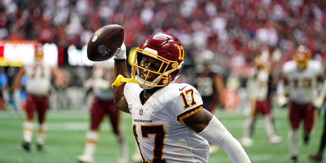 Washington receiver Terry McLaurin celebrates a touchdown against the Atlanta Falcons during the second half of the game on October 3, 2021 in Atlanta. 