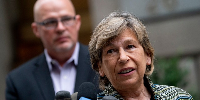 Randi Weingarten, president of the American Federation of Teachers and a member of the AFL–CIO, speaks alongside Michael Mulgrew, president of the United Federation of Teachers, a New York City teachers union, left, during a news conference, Monday, Oct. 4, 2021, in the Manhattan borough of New York. (AP Photo/John Minchillo)