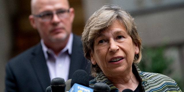 Randi Weingarten speaks to the press