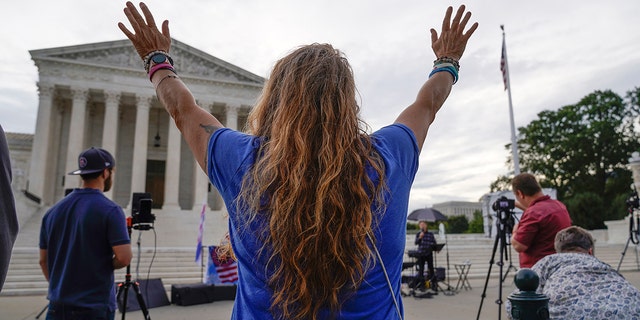 The Supreme Court is seen on the first day of the new term as activists opposed to abortion demonstrate on the plaza, in Washington, Monday, Oct. 4, 2021. President Biden's Supreme Court commission has a "vocal minority" who "aren't willing to let court-packing go," according to Cato Institute Vice President Ilya Shapiro. (AP Photo/J. Scott Applewhite)