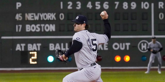 New York Yankees starting pitcher Gerrit Cole delivers to the Boston Red Sox in the first inning of the American League Wild Card playoff game at Fenway Park on Tuesday, October 5, 2021 in Boston. 