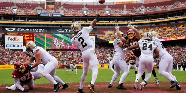 New Orleans Saints quarterback Jameis Winston throws a pass in the first half against the Washington Football Team, Sunday, Oct. 10, 2021, in Landover, Maryland.
